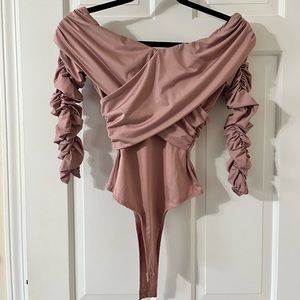 Mauve criss cross bodysuit!